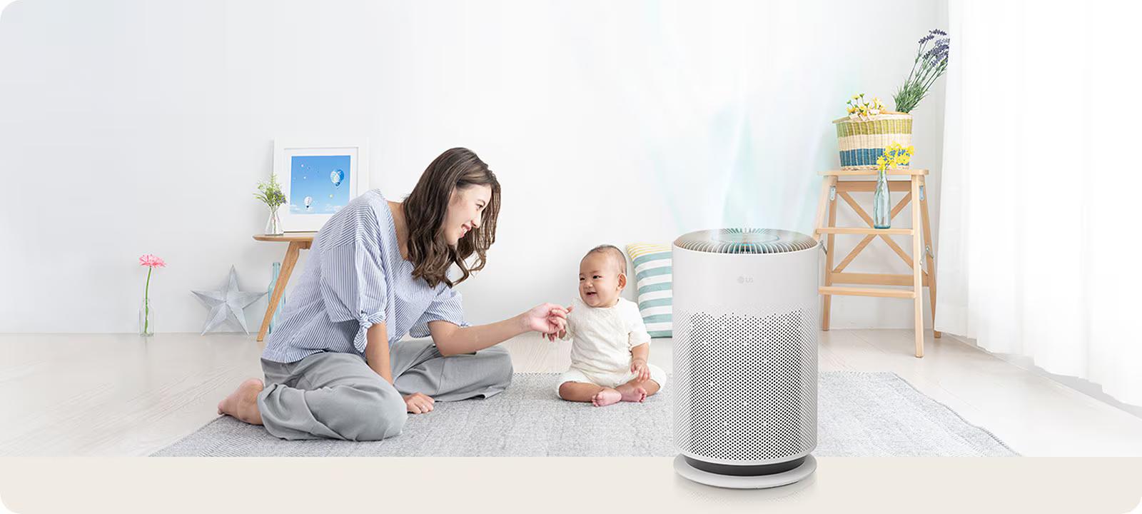 Mother and baby enjoying clean air with LG Air Purifier